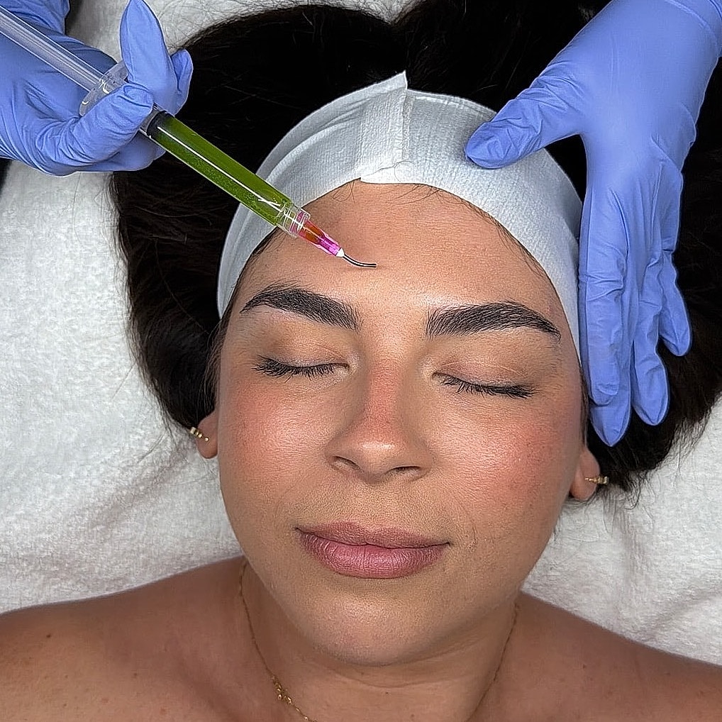 Professional skincare treatment in progress.