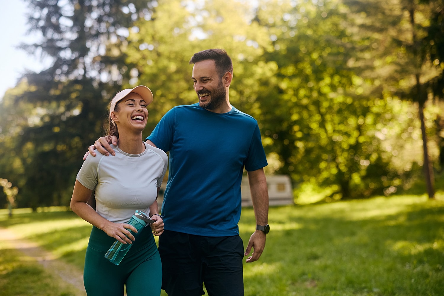 Couple enjoying a joyful outdoor walk together.